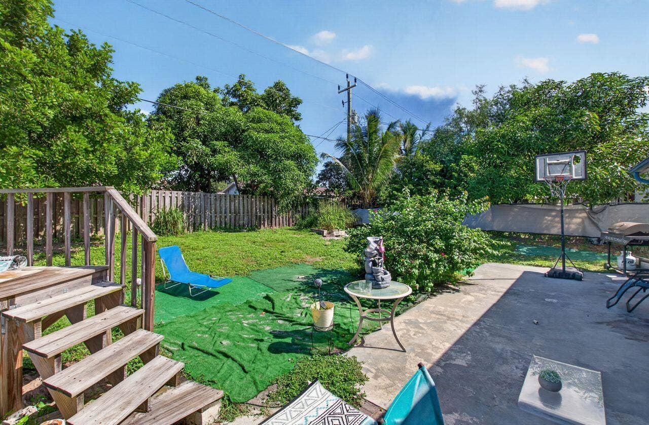 731 SW 1st Court, Boynton Beach, FL 33426 Raised pool in backyard