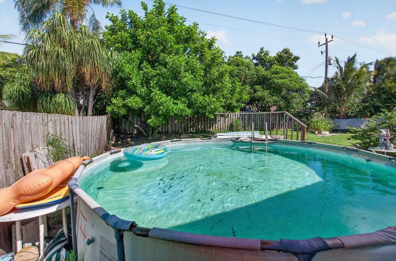 731 SW 1st Court, Boynton Beach, FL 33426 Raised pool in backyard