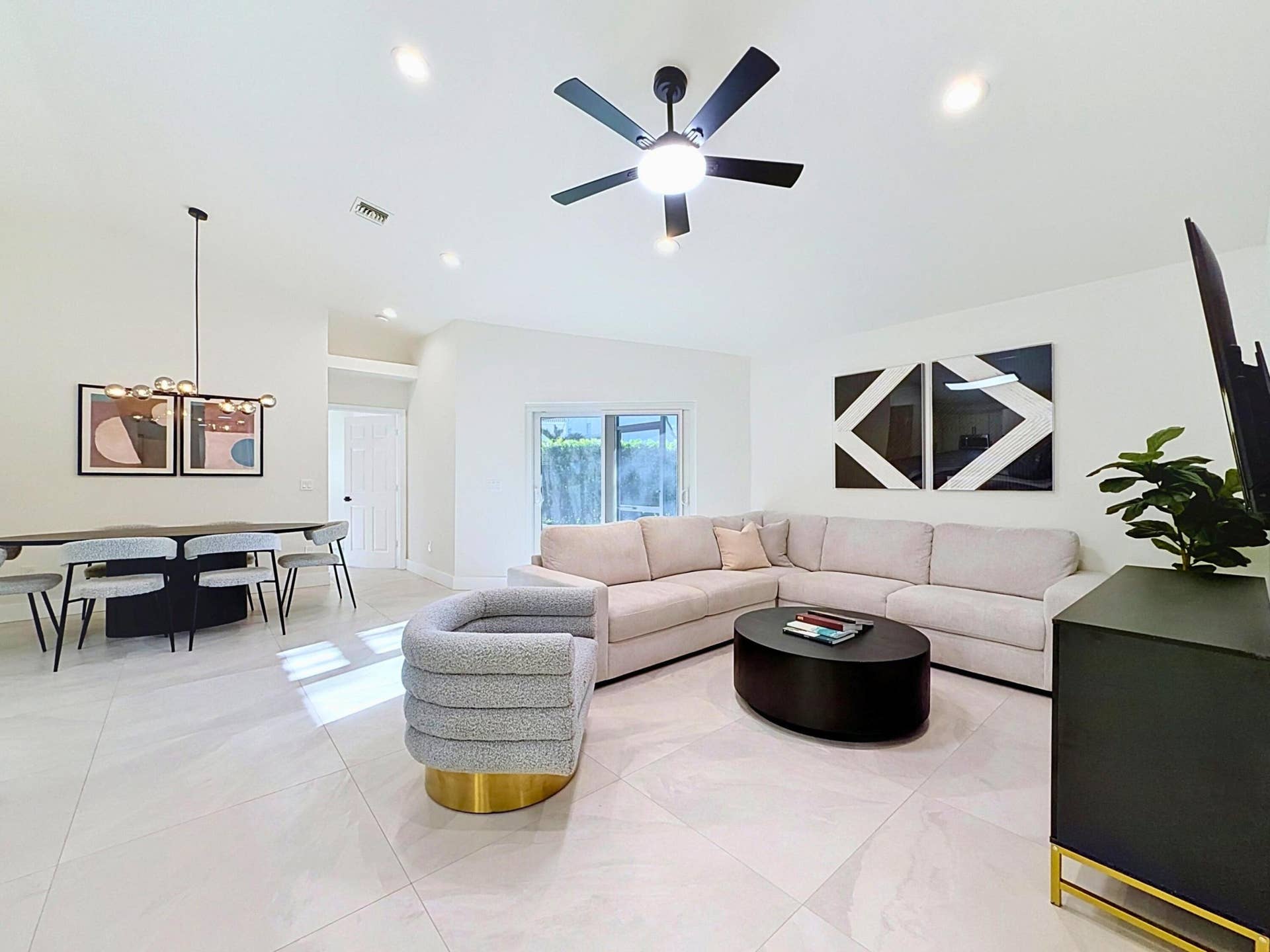 Great Room features vaulted ceilings and great natural light!