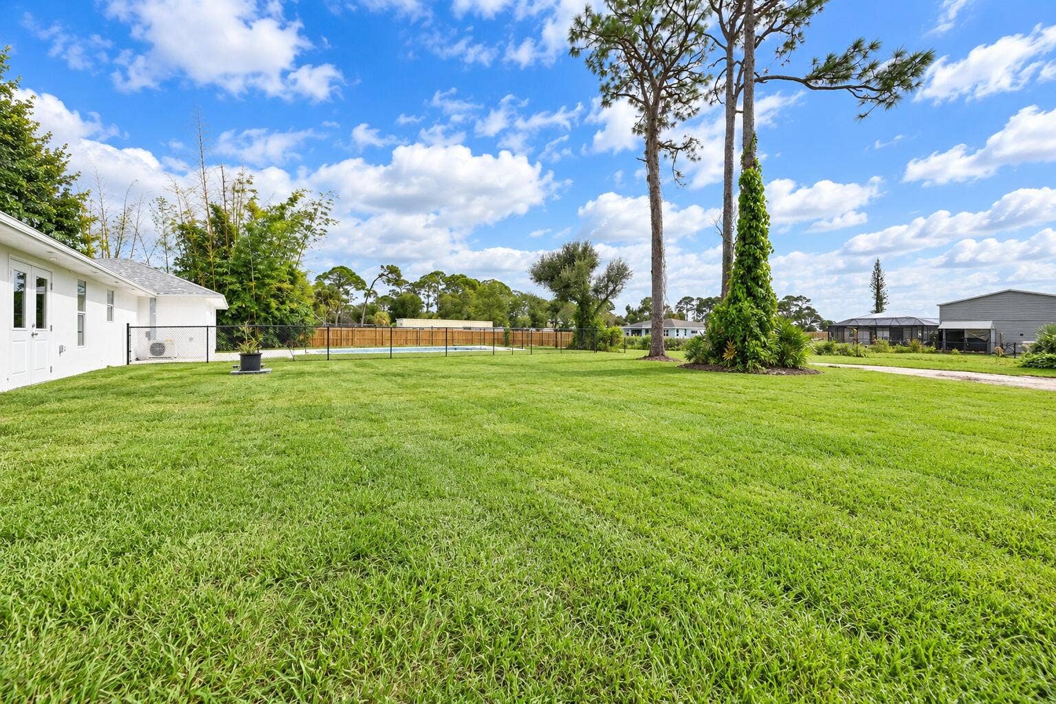 8721 HIDDEN PINES Road, Fort Pierce, FL 34945 Rear
