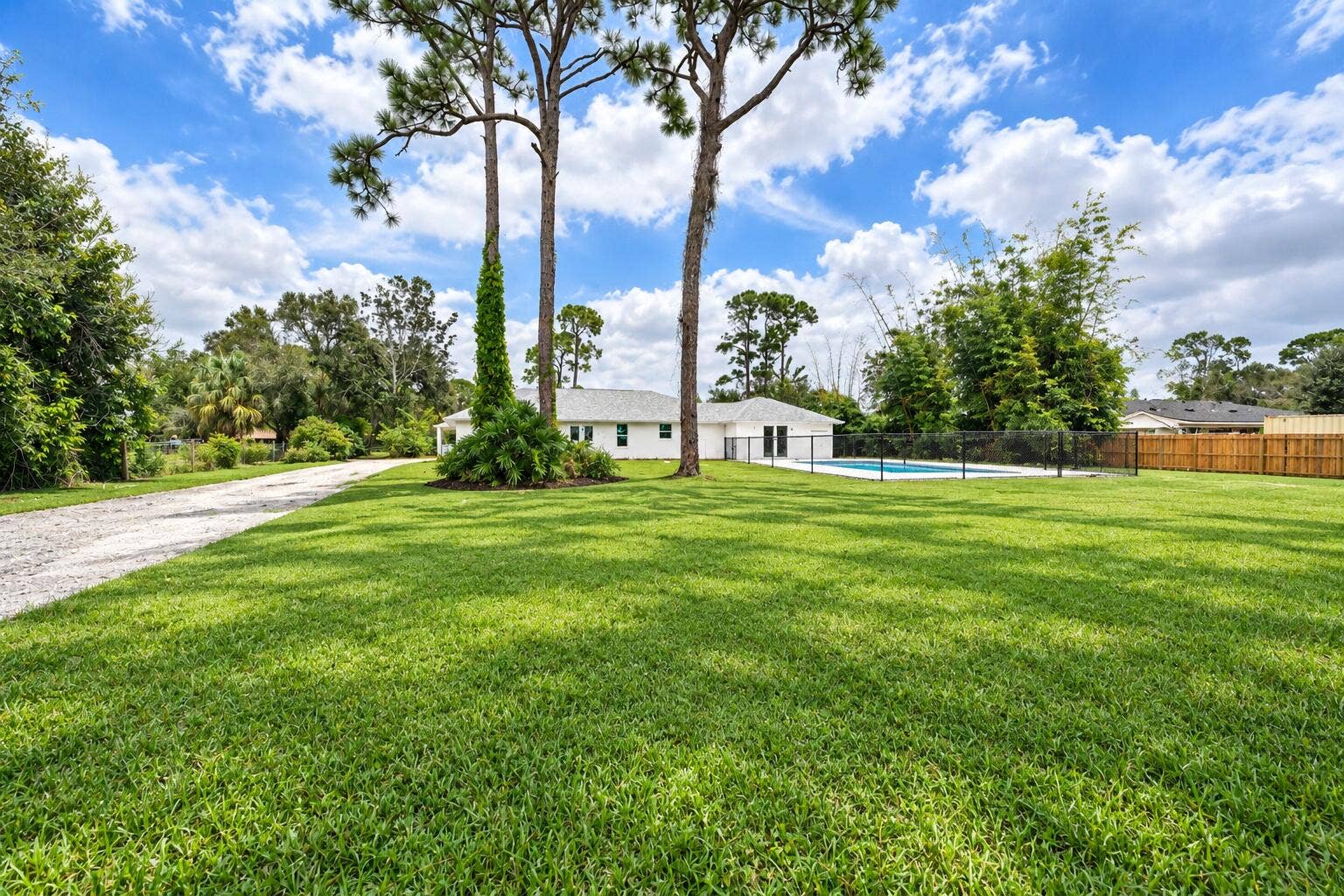 8721 HIDDEN PINES Road, Fort Pierce, FL 34945 Rear