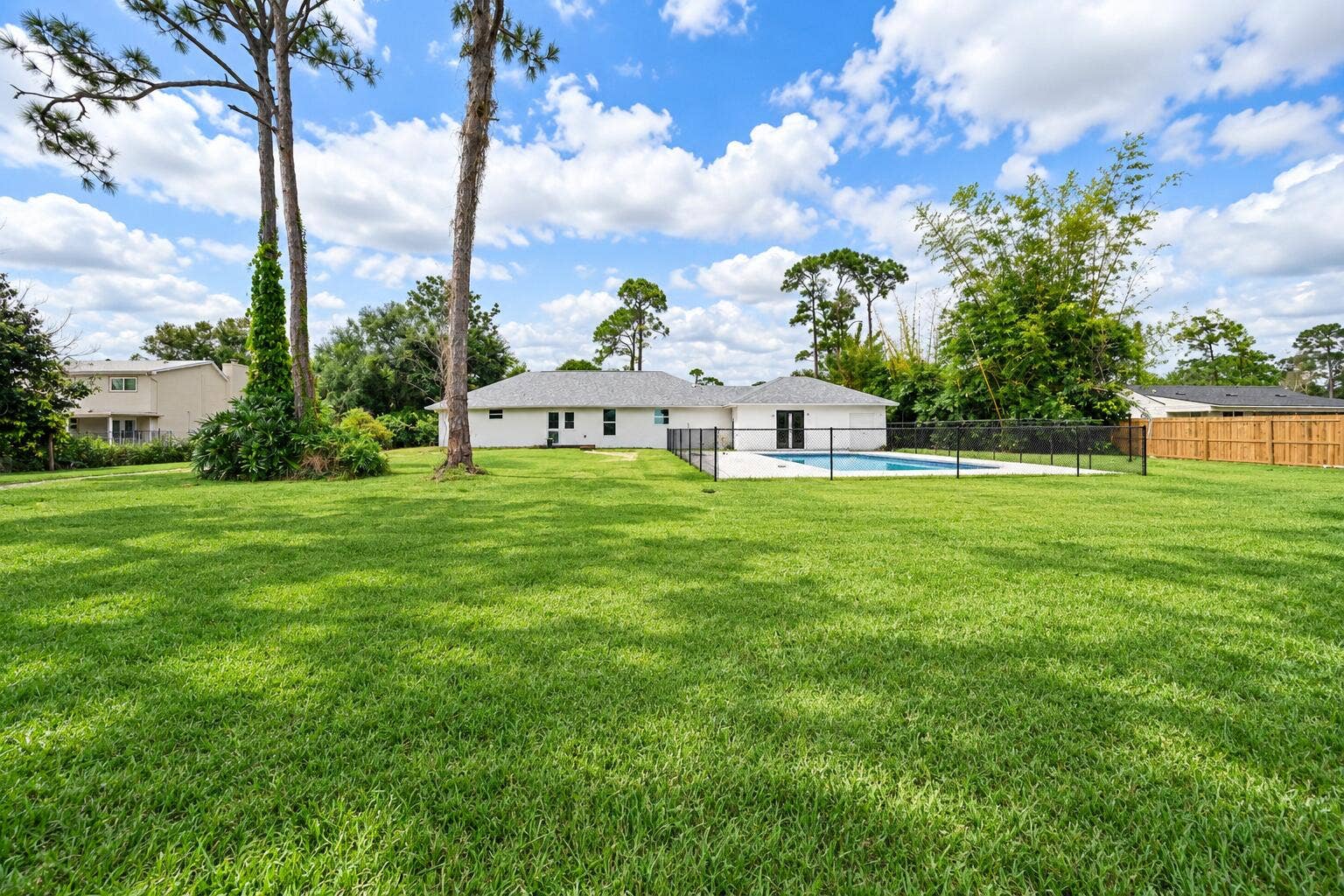 8721 HIDDEN PINES Road, Fort Pierce, FL 34945 Rear