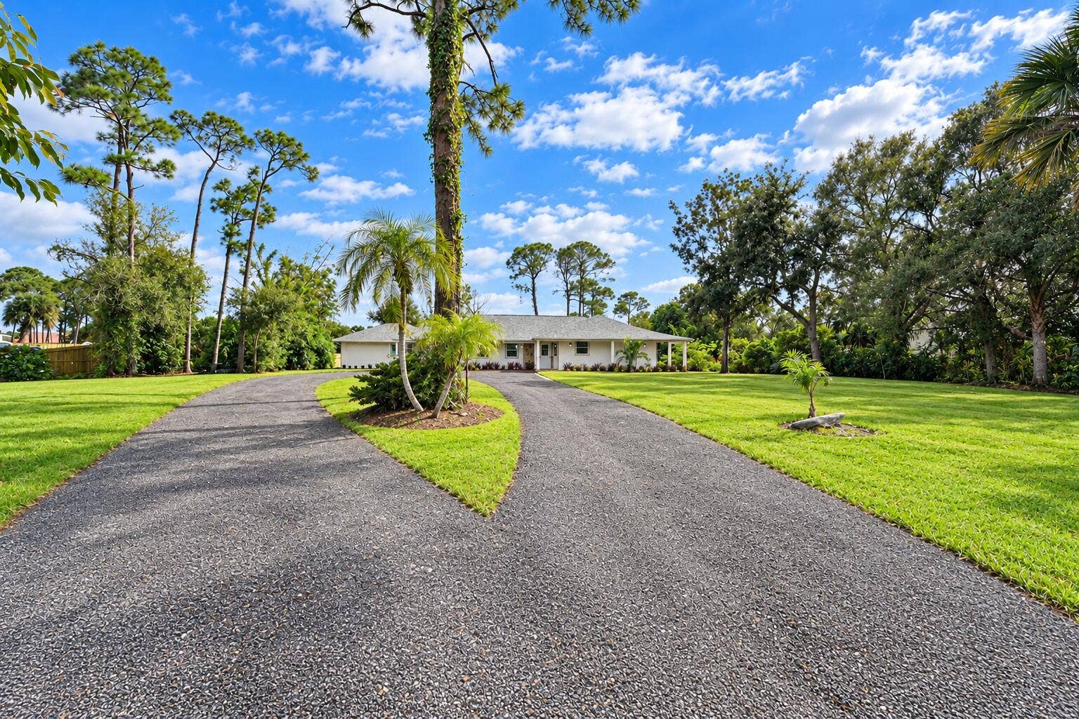 8721 HIDDEN PINES Road, Fort Pierce, FL 34945 Front
