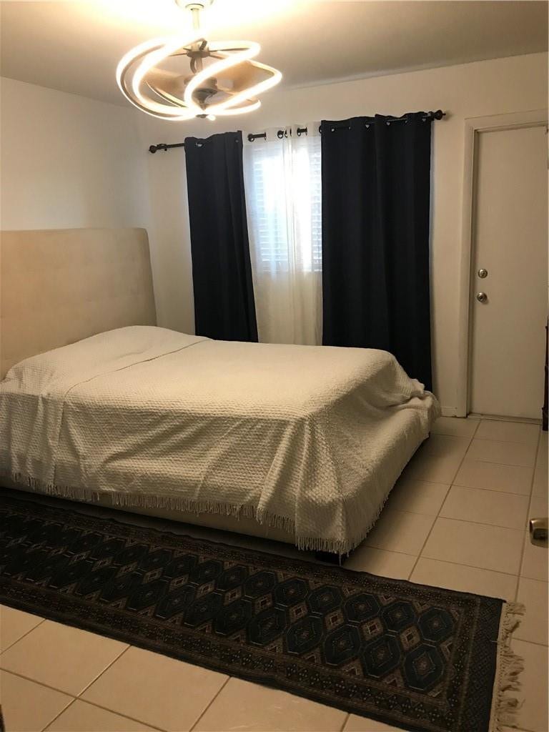 941 CRYSTAL LAKE Drive, #105, Deerfield Beach, FL 33064 primary bedroom