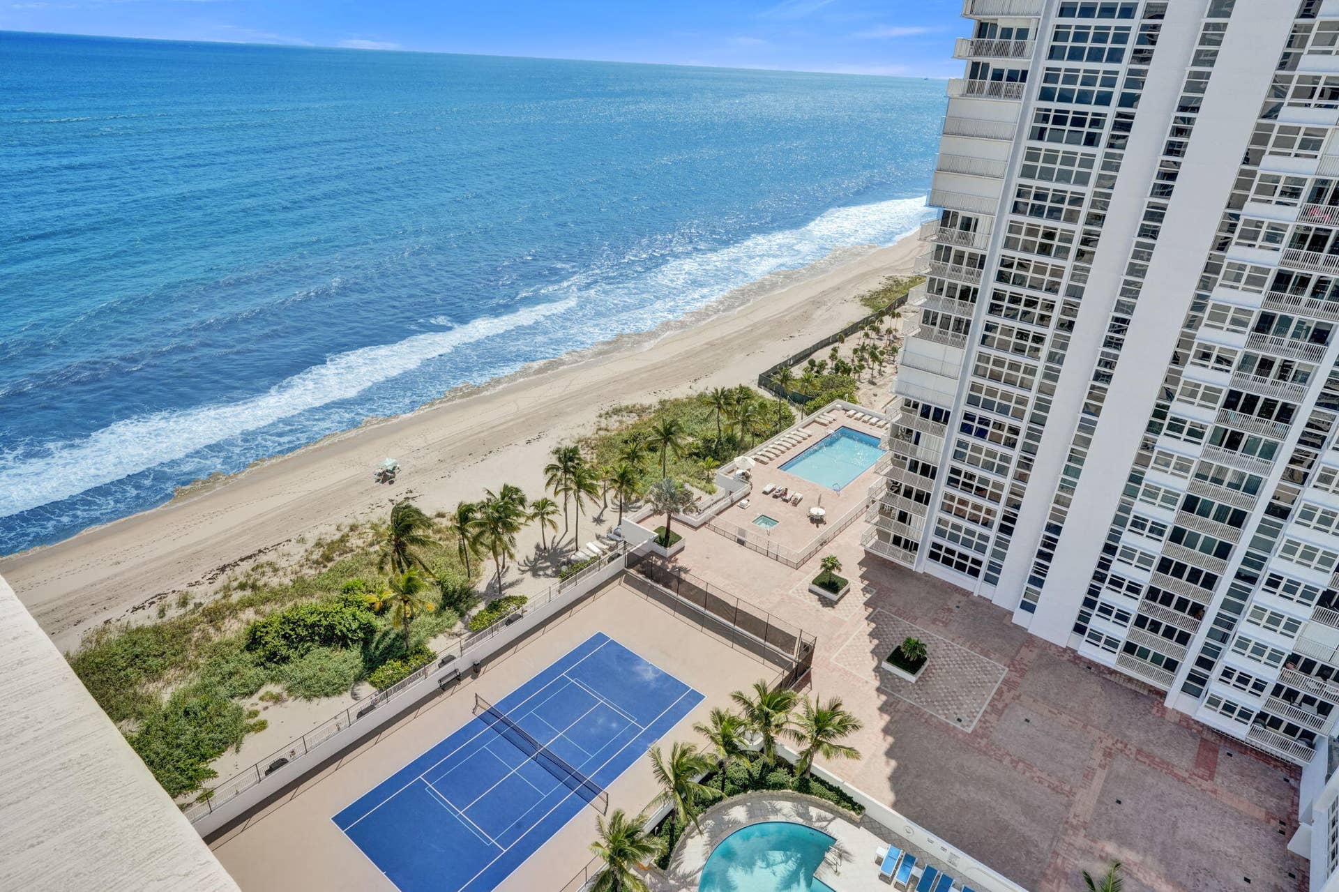 View of ocean, pool and tennis from balcony