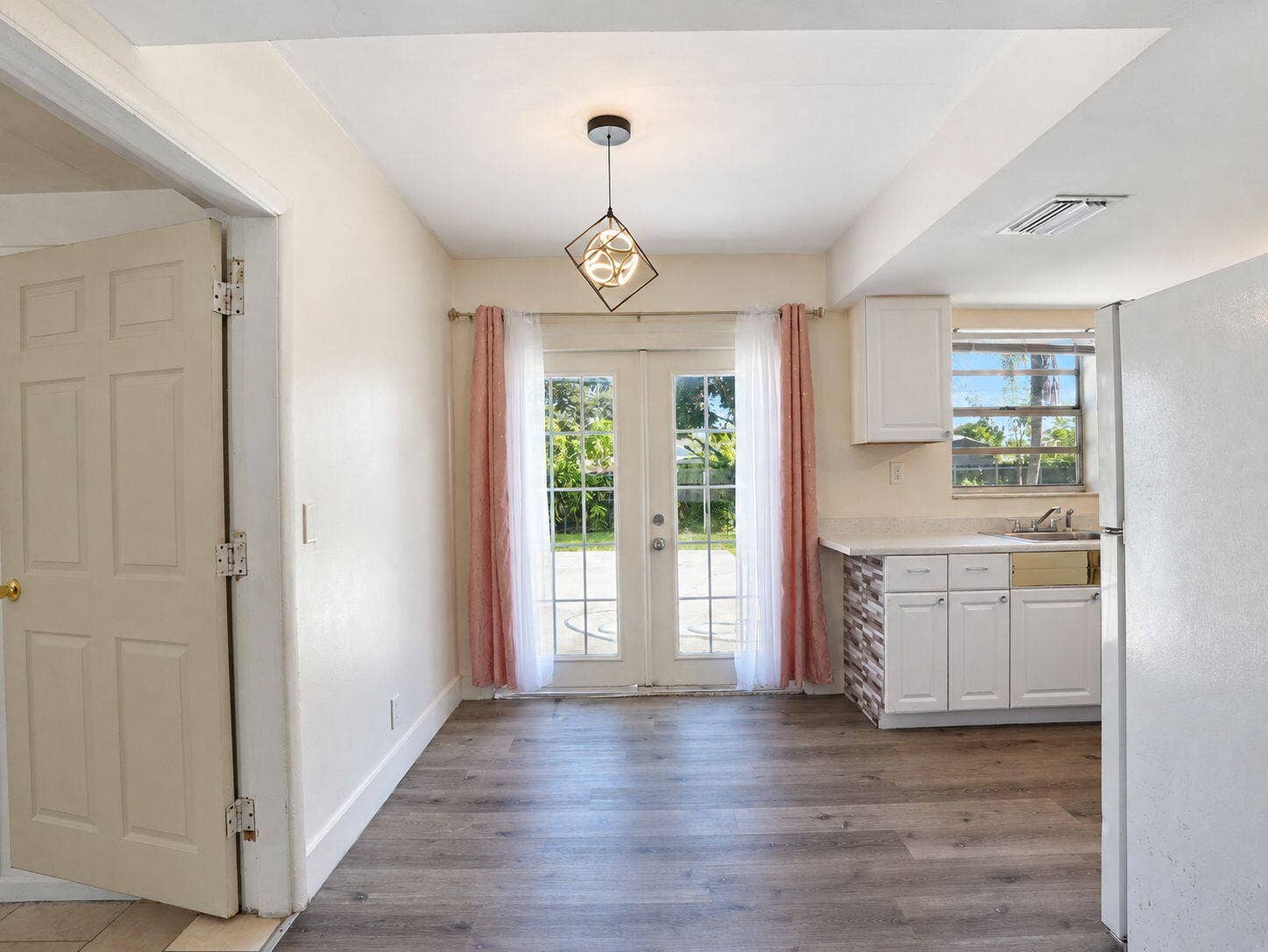1805 NW 13TH Court, Fort Lauderdale, FL 33311 Dining room with French doors opening to the backyard