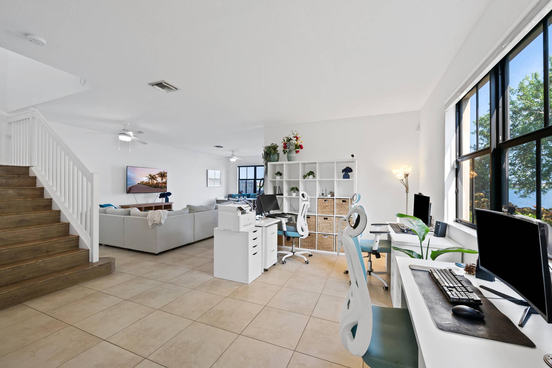 Expansive, versatile space currently used as a home office with endless possibilities for a formal dining room, game room, additional living area and more