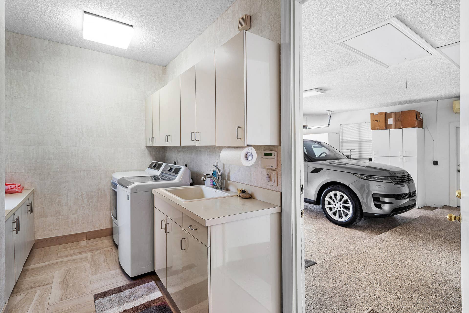 7235 QUEENFERRY Circle, Boca Raton, FL 33496 Laundry Room and Garage