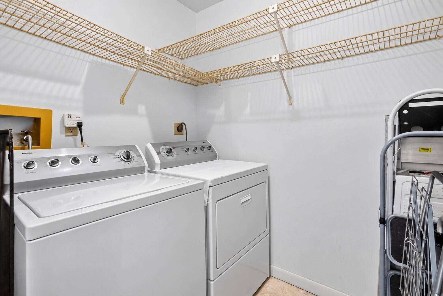 15216 Lakes Of Delray Boulevard, #142, Delray Beach, FL 33484 Clean Empty Laundry Room with Shelving