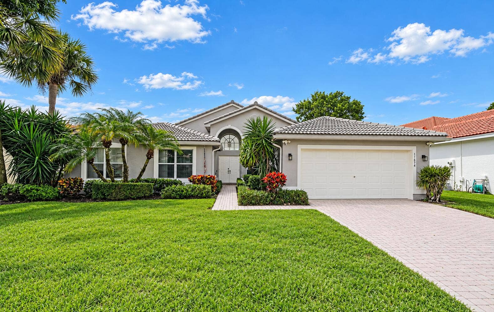 11674 Caracas Boulevard, Boynton Beach, FL 33437 Mediterranean Suburban Home with Tropica