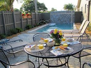 2225 NE 14th Avenue, #1, Wilton Manors, FL 33305 Pool and patio shared by three apartments.