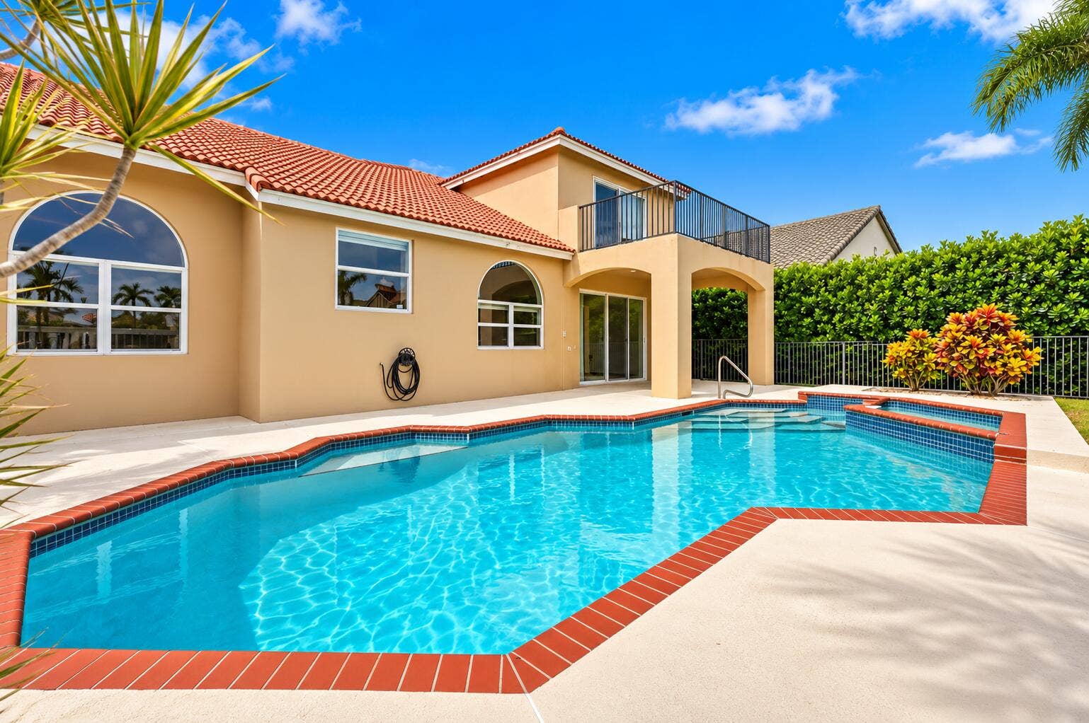 10671 St Thomas Drive, Boca Raton, FL 33498 Resort-style living right in your own backyard! This spectacular private pool and spa create the perfect setting for relaxation, entertaining, and soaking up the South Florida sunshine.