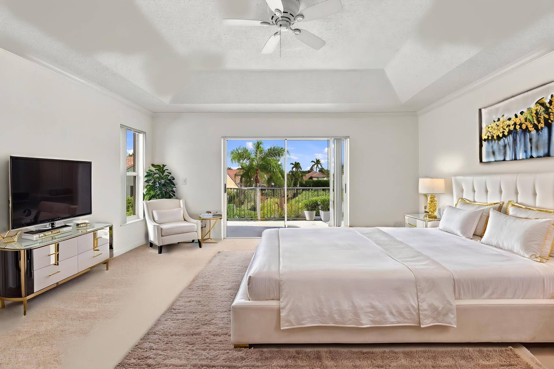 10671 St Thomas Drive, Boca Raton, FL 33498 Wake up to beautiful waterfront views! Sliding glass doors open directly onto a private second-story balcony overlooking the tranquil lake and tropical surroundings.