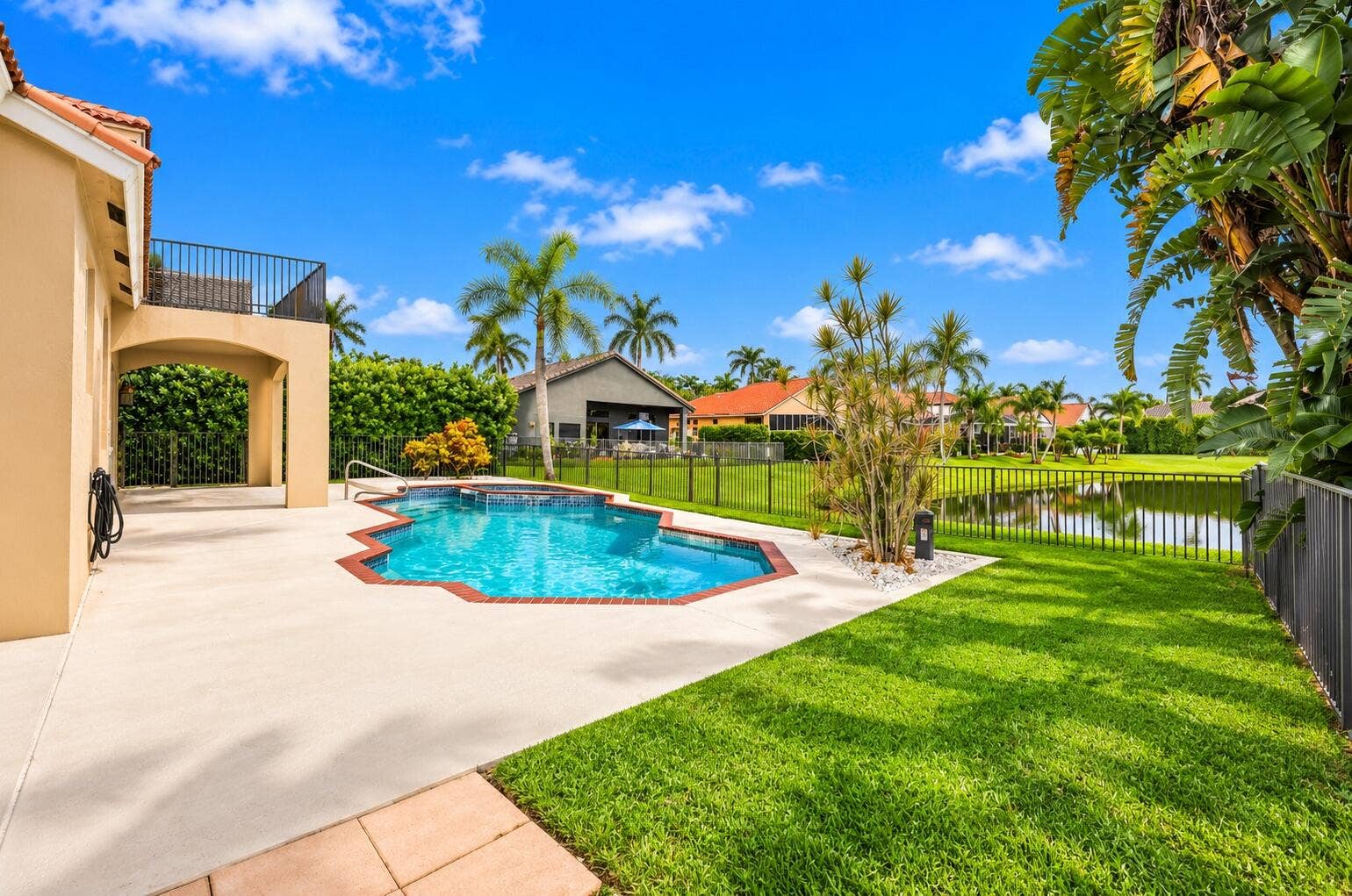 10671 St Thomas Drive, Boca Raton, FL 33498 Your own private waterfront paradise! Enjoy the sparkling pool and spa surrounded by lush tropical landscaping and breathtaking lake views.