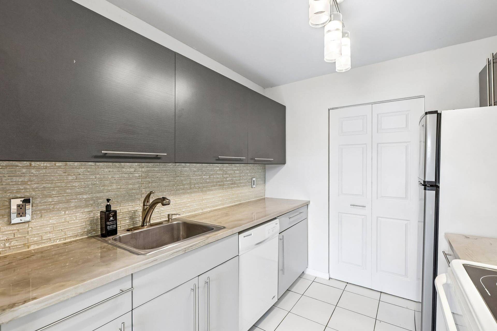 500 NE 2nd Street, #204, Dania Beach, FL 33004 05_Kitchen-Sink-and-Cabinetry_Original-0
