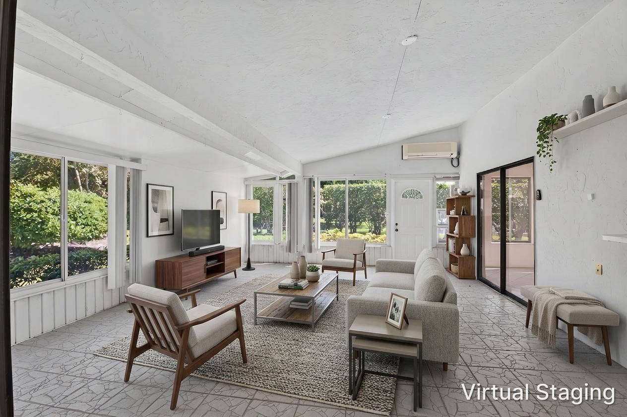 2915 Riviera Drive, Delray Beach, FL 33445 This enclosed Florida room is an extension of your living space.