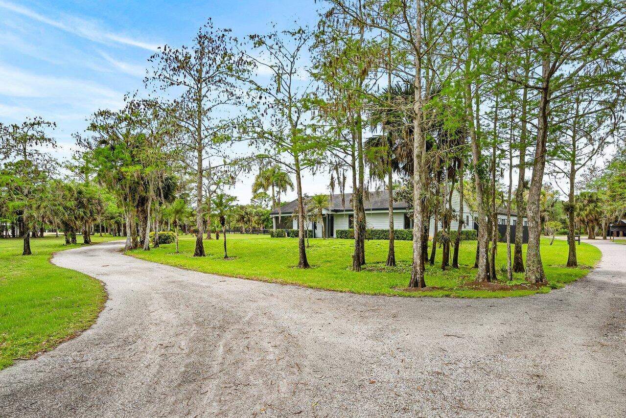 2741 Buck Ridge Trail, Loxahatchee, Loxahatchee, FL 33470 Driveway and House view