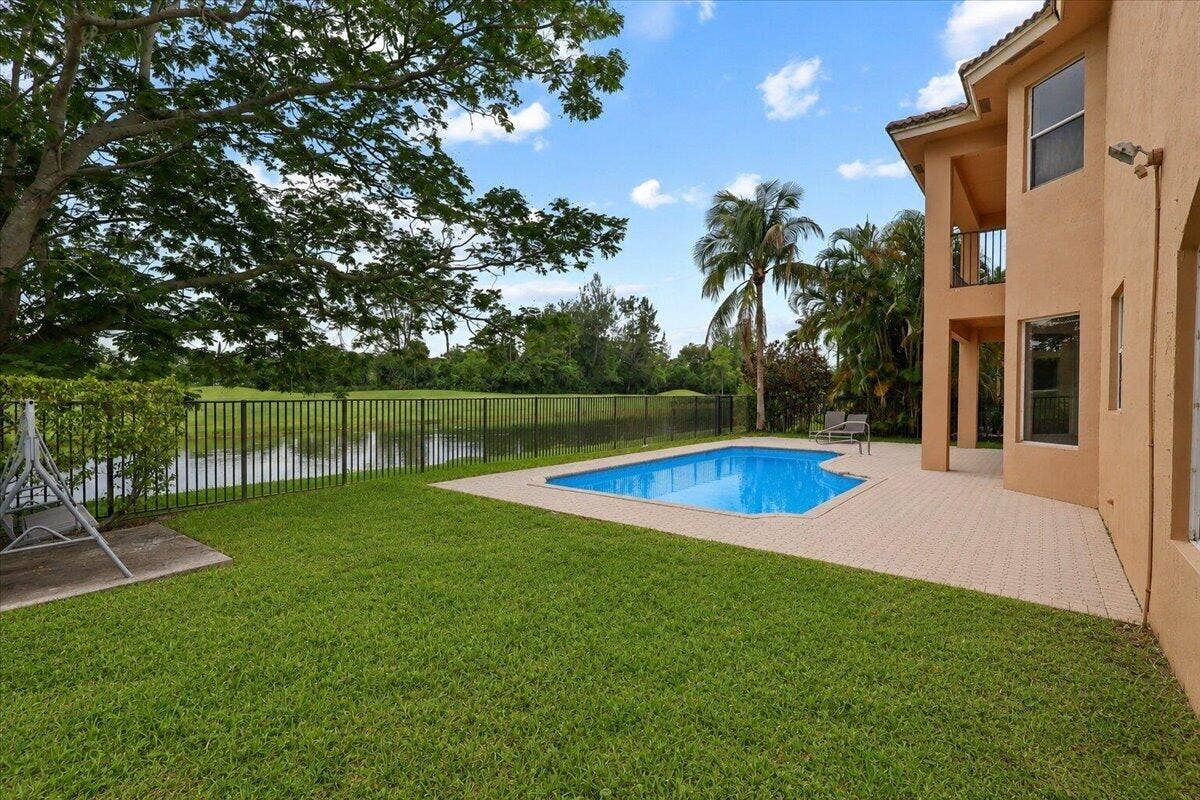 1831 Waldorf Drive E, Royal Palm Beach, FL 33411 BACKYARD WITH POOL DECK