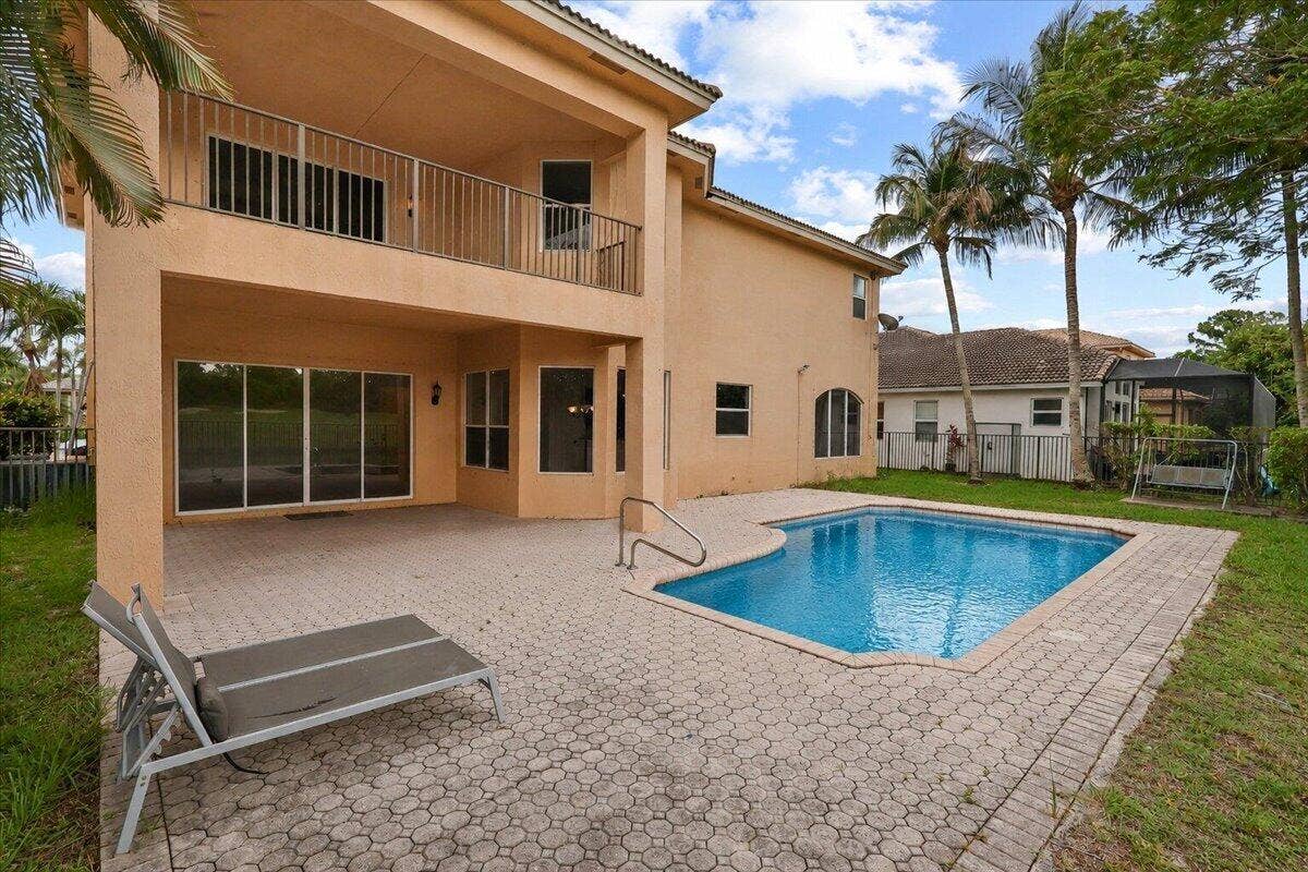1831 Waldorf Drive E, Royal Palm Beach, FL 33411 BACKYARD WITH POOL DECK