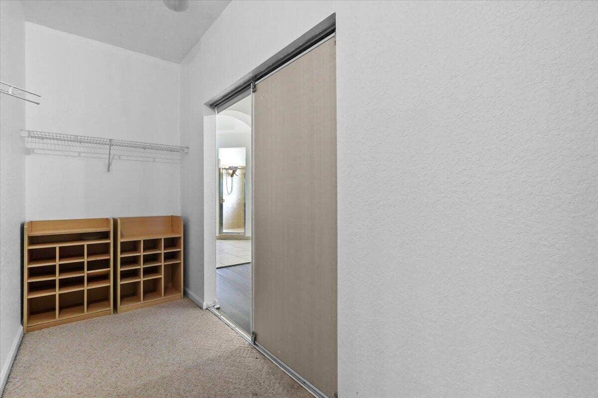 1831 Waldorf Drive E, Royal Palm Beach, FL 33411 EN-SUITE WALK-IN CLOSET IN MAIN MASTER SUITE ON SECOND FLOOR
