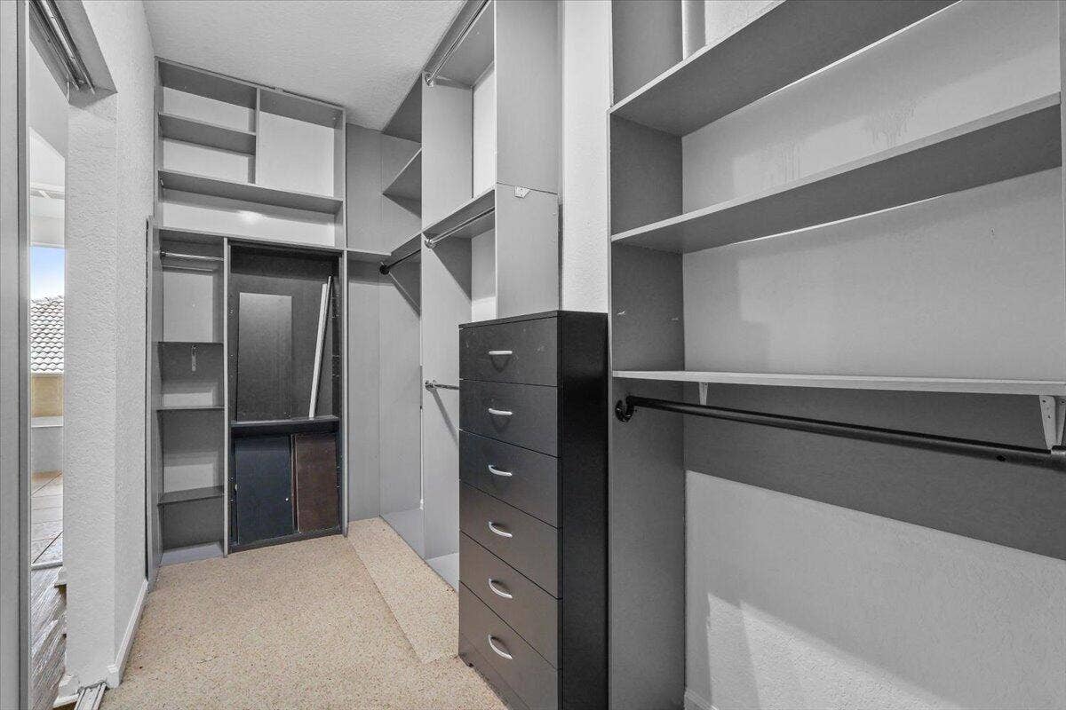 1831 Waldorf Drive E, Royal Palm Beach, FL 33411 EN-SUITE WALK-IN CLOSET IN MAIN MASTER SUITE ON SECOND FLOOR