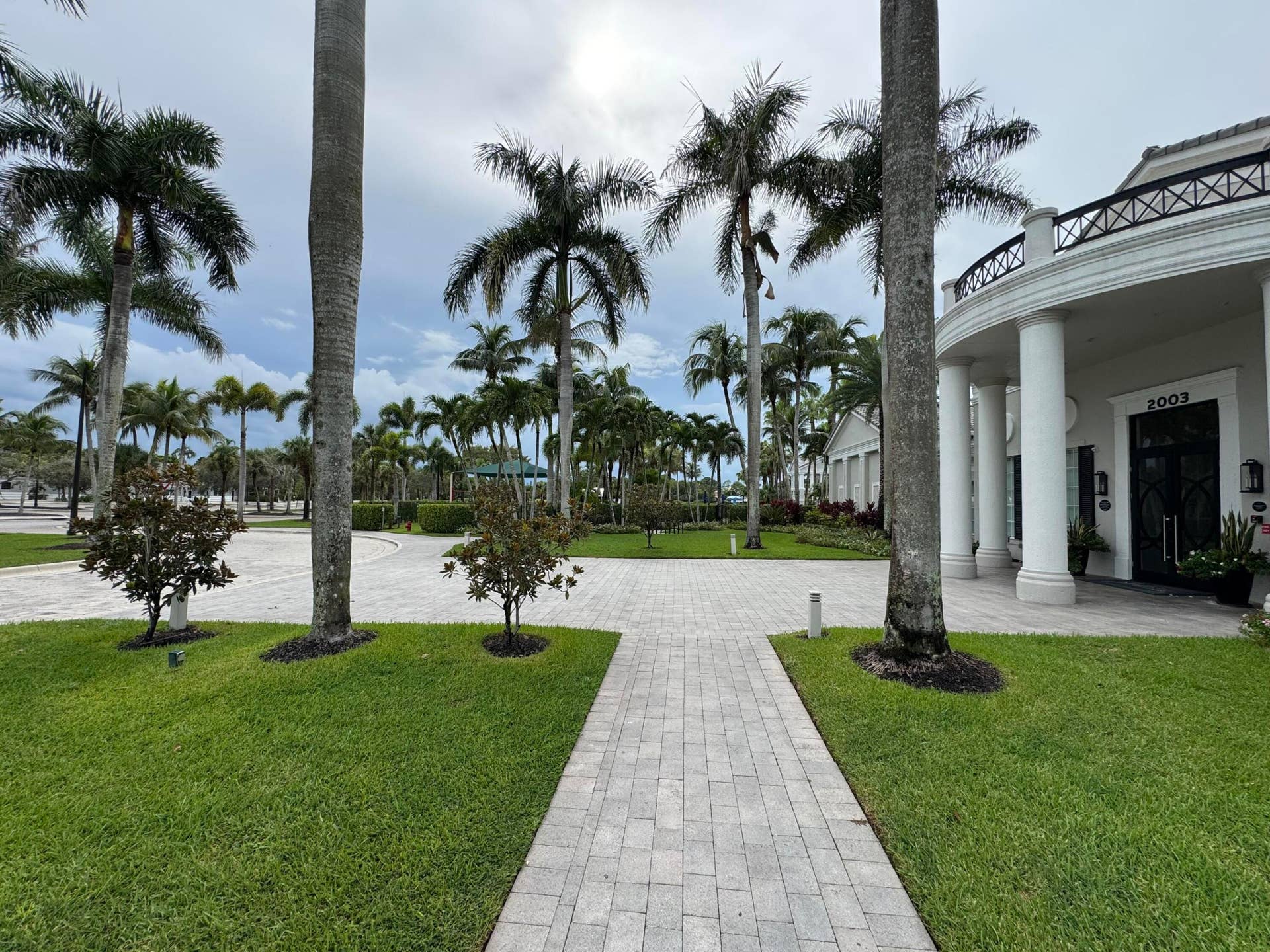 1831 Waldorf Drive E, Royal Palm Beach, FL 33411 FRONT VIEW OF CLUBHOUSE ENTRANCE