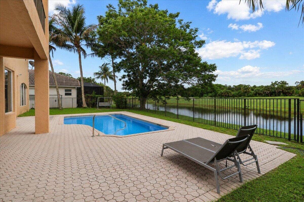 1831 Waldorf Drive E, Royal Palm Beach, FL 33411 BACKYARD WITH POOL DECK