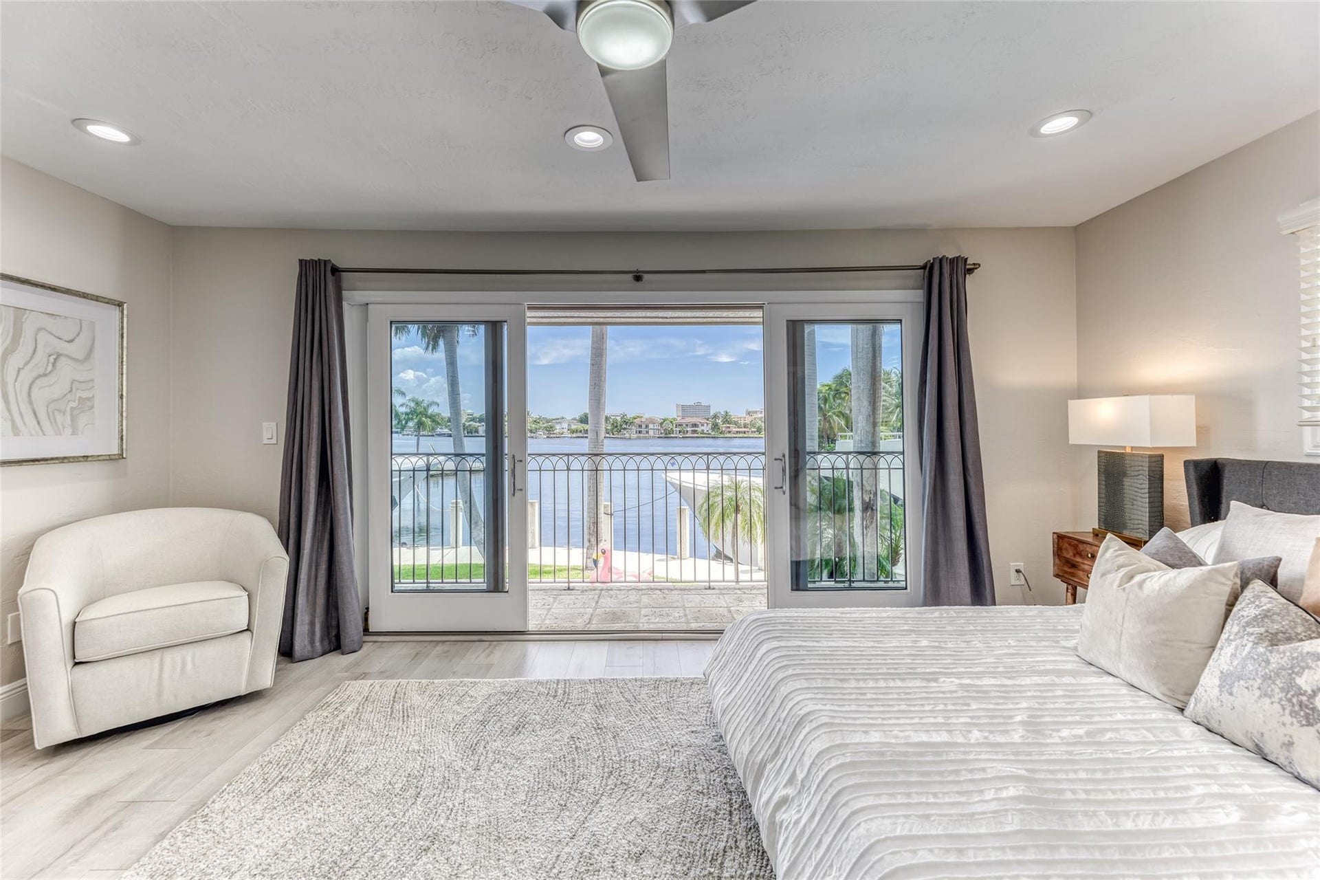 616 1st Key Drive, Fort Lauderdale, FL 33304 BEDROOM #2 (Upstairs) KING Size with balcony overlooking waterway with en suite bathroom, shower, smart TV