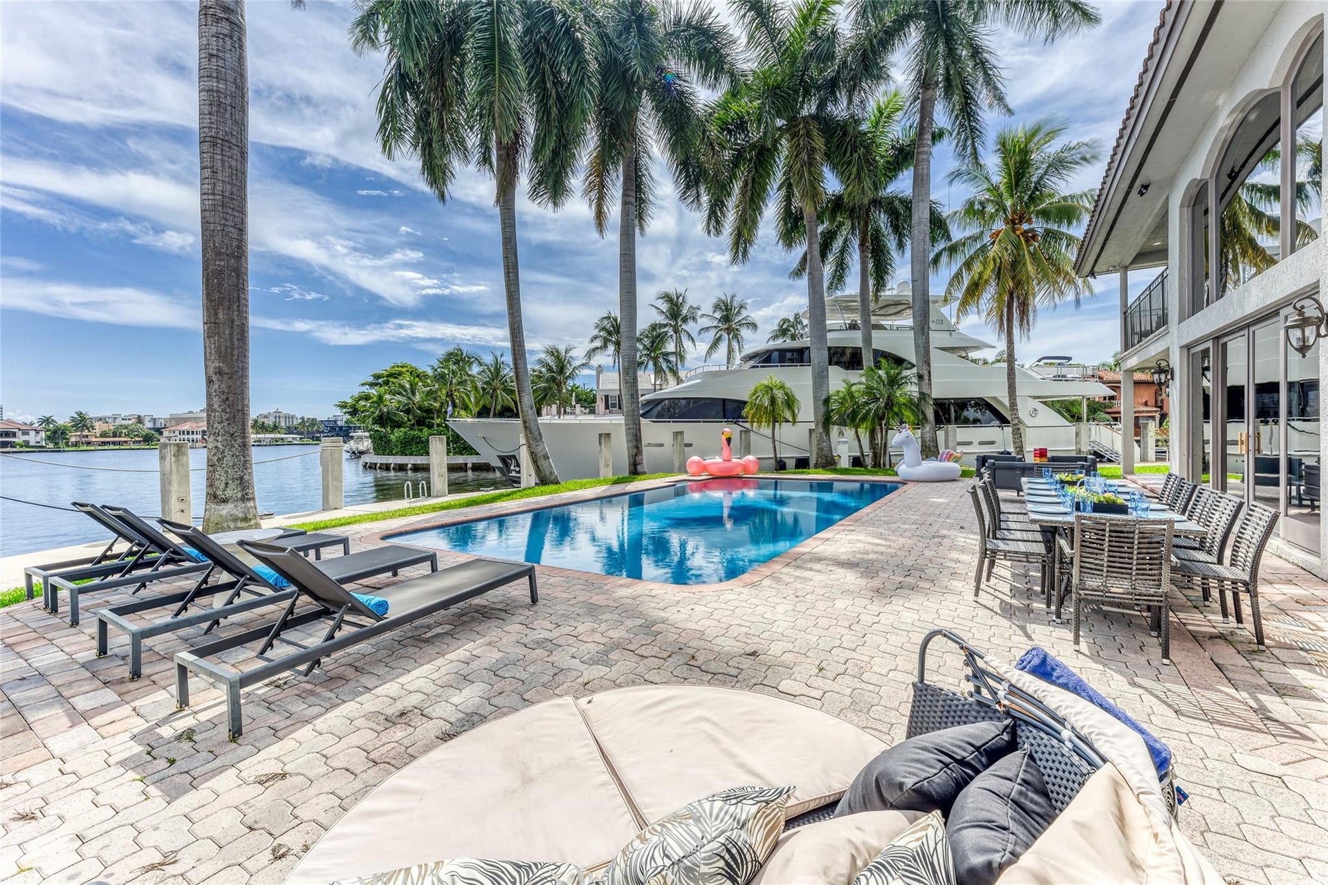 616 1st Key Drive, Fort Lauderdale, FL 33304 Outdoor waterfront Point Lot with pool area with outdoor dining, lounge chairs, BBQ & siting area.