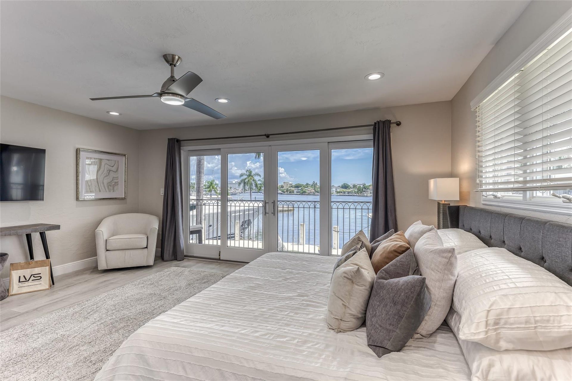 616 1st Key Drive, Fort Lauderdale, FL 33304 BEDROOM #2 (Upstairs) KING Size with balcony overlooking waterway with en suite bathroom, shower, smart TV