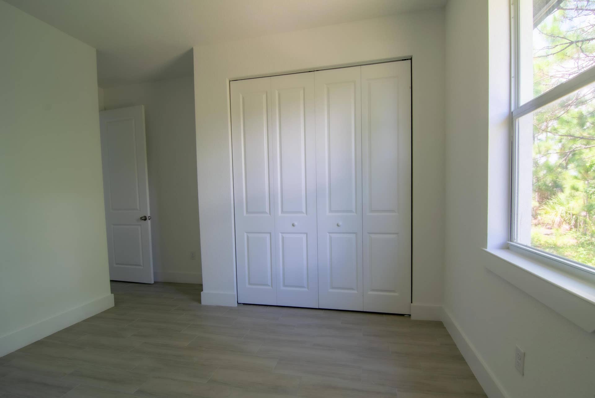 Bright Bedroom with Closet