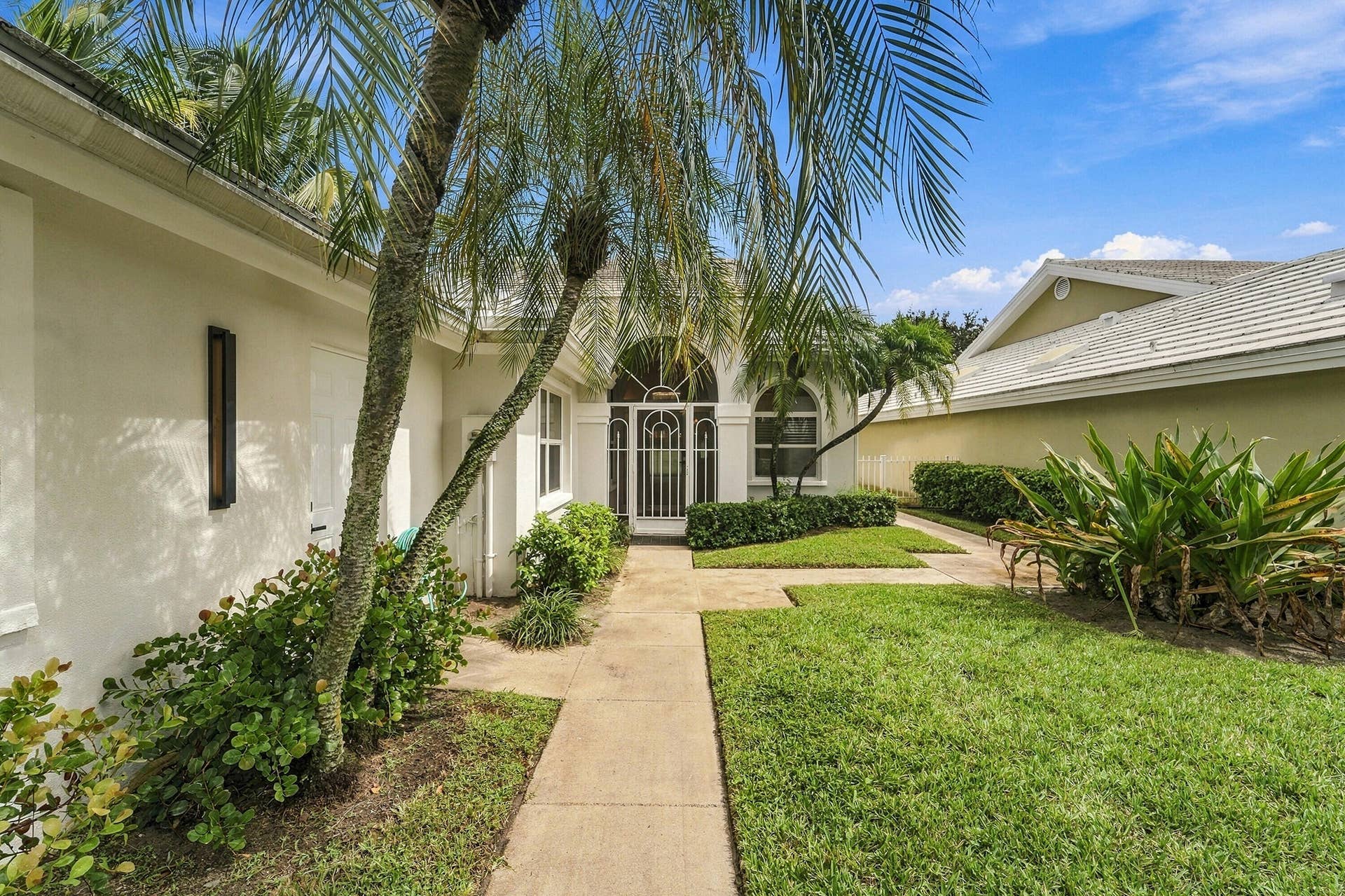 2398 SARATOGA BAY Drive, West Palm Beach, FL 33409 Brand new landscaping