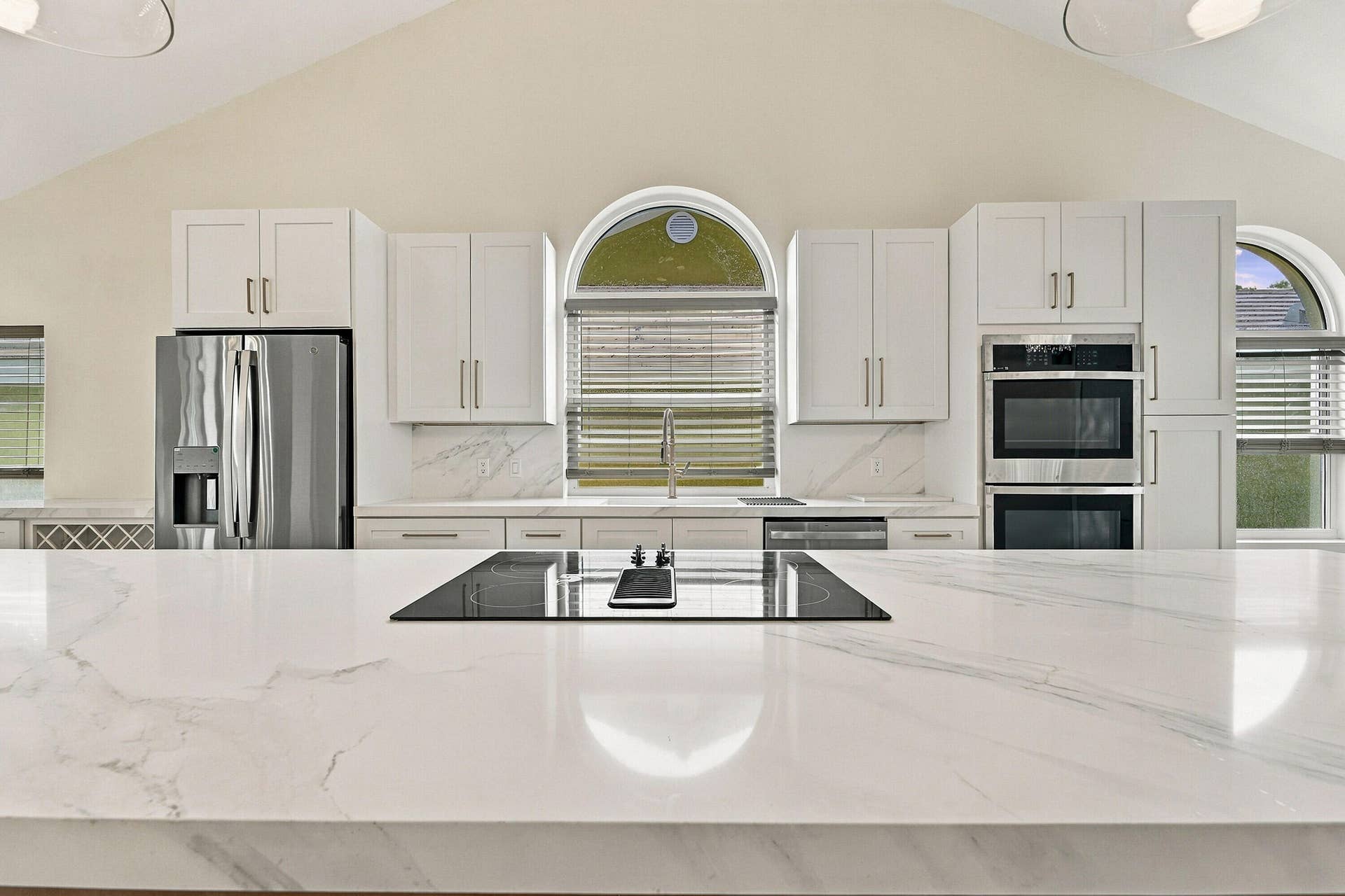 2398 SARATOGA BAY Drive, West Palm Beach, FL 33409 Oversized kitchen island for entertaining guests