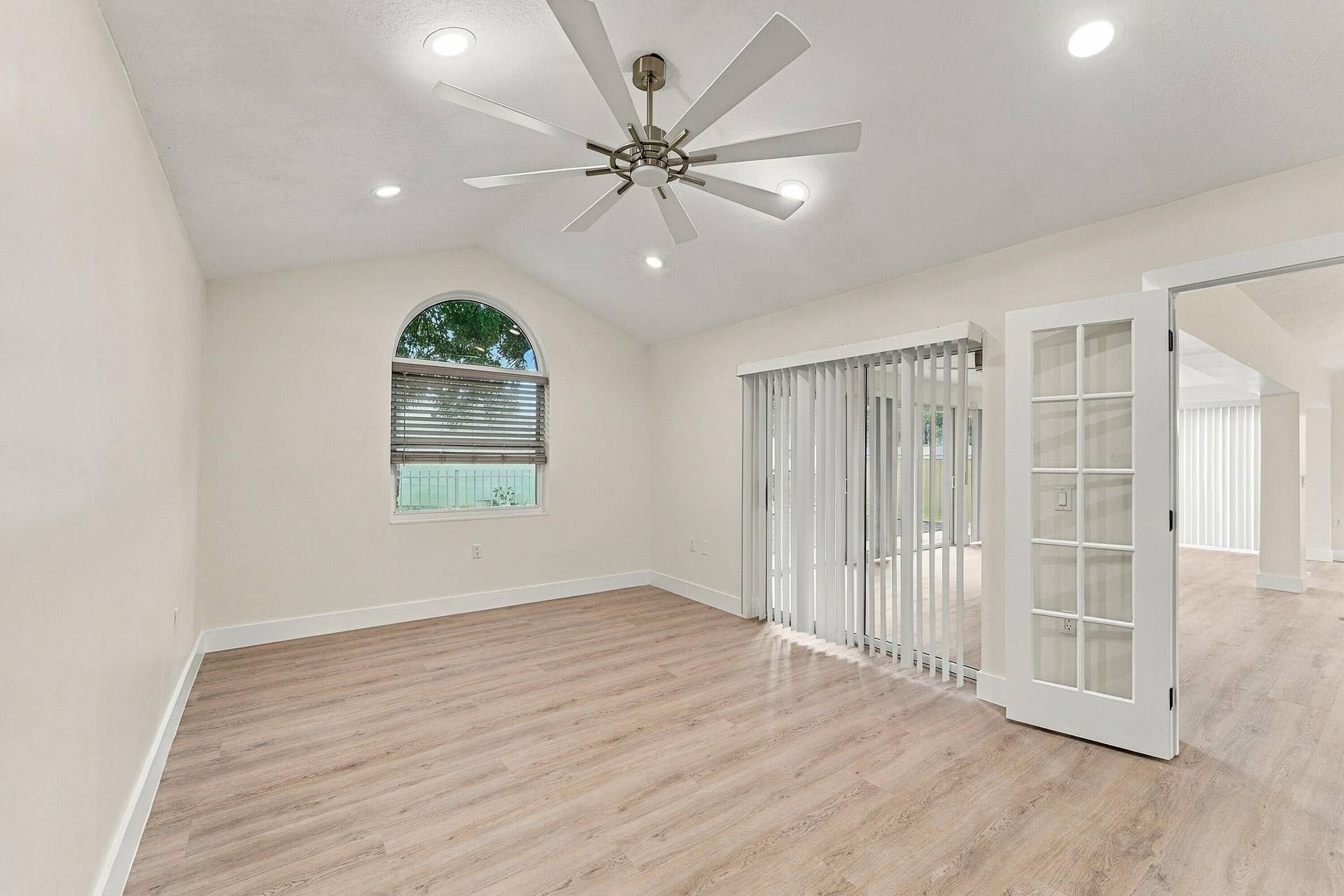 2398 SARATOGA BAY Drive, West Palm Beach, FL 33409 Primary bedroom with custom french doors