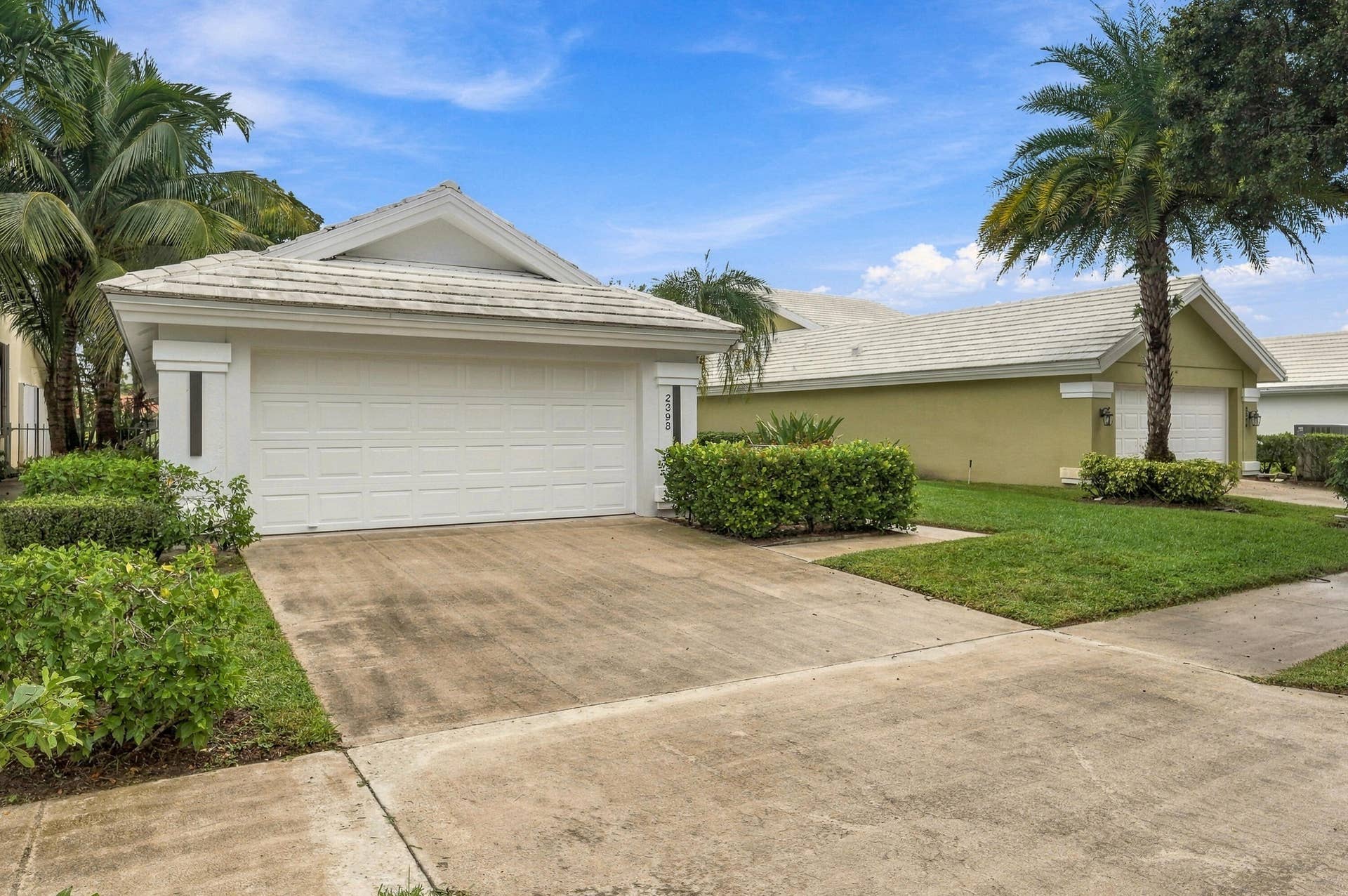 2398 SARATOGA BAY Drive, West Palm Beach, FL 33409 Welcome home to this beautifully freshly painted masterpiece