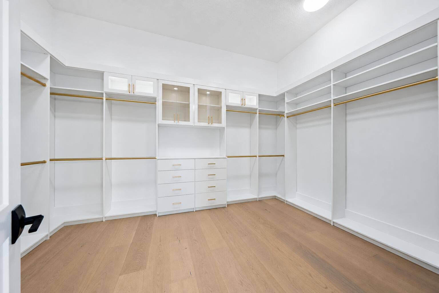 13271 Artisan Circle, Palm Beach Gardens, FL 33418 Minimalist White Walk-In Closet with Bra