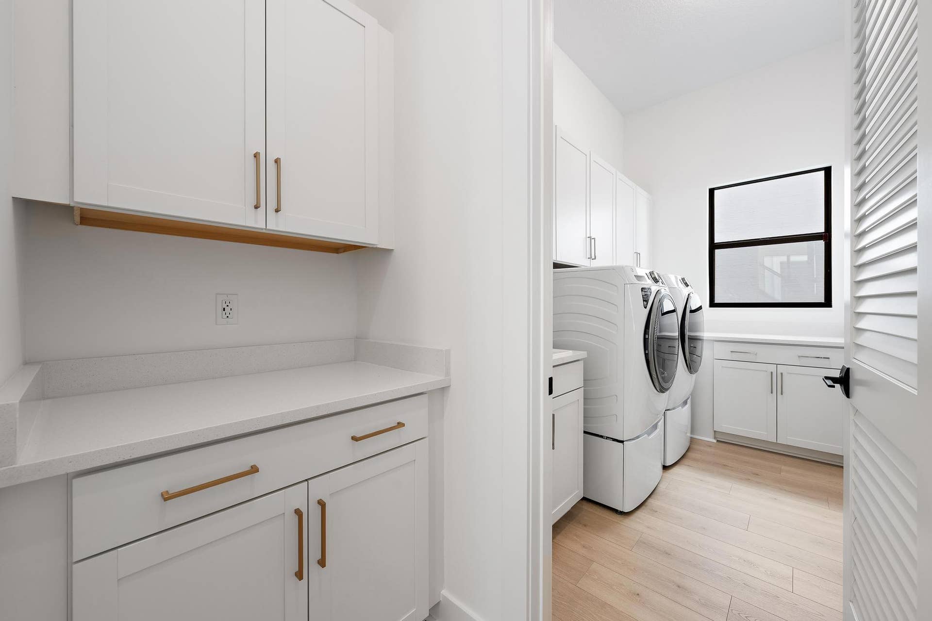 13271 Artisan Circle, Palm Beach Gardens, FL 33418 Laundry Room with Storage Cabinetry