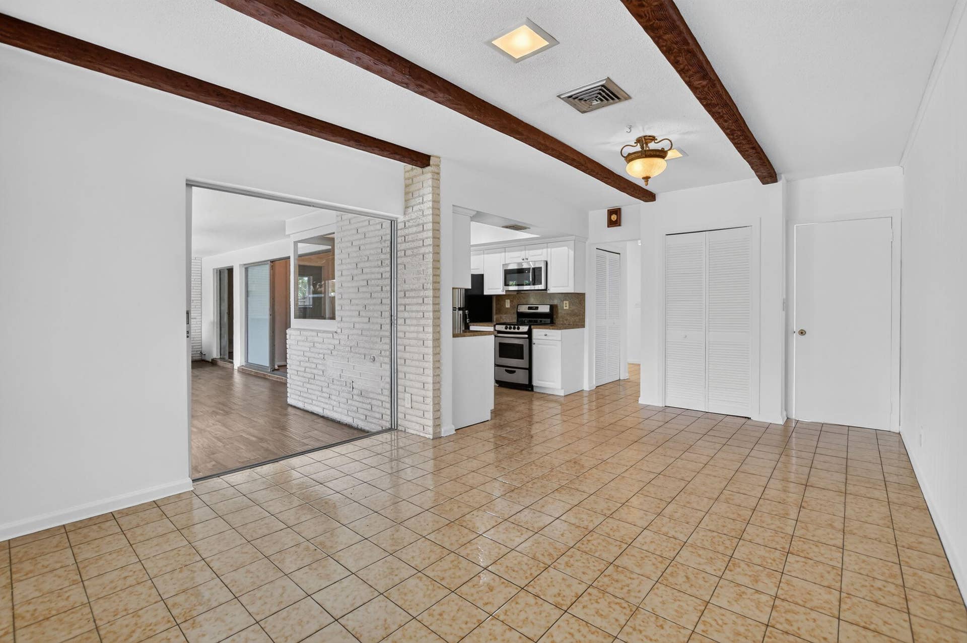 2175 Park Place, Boca Raton, FL 33486 Family Room with Wood Beam Ceilings