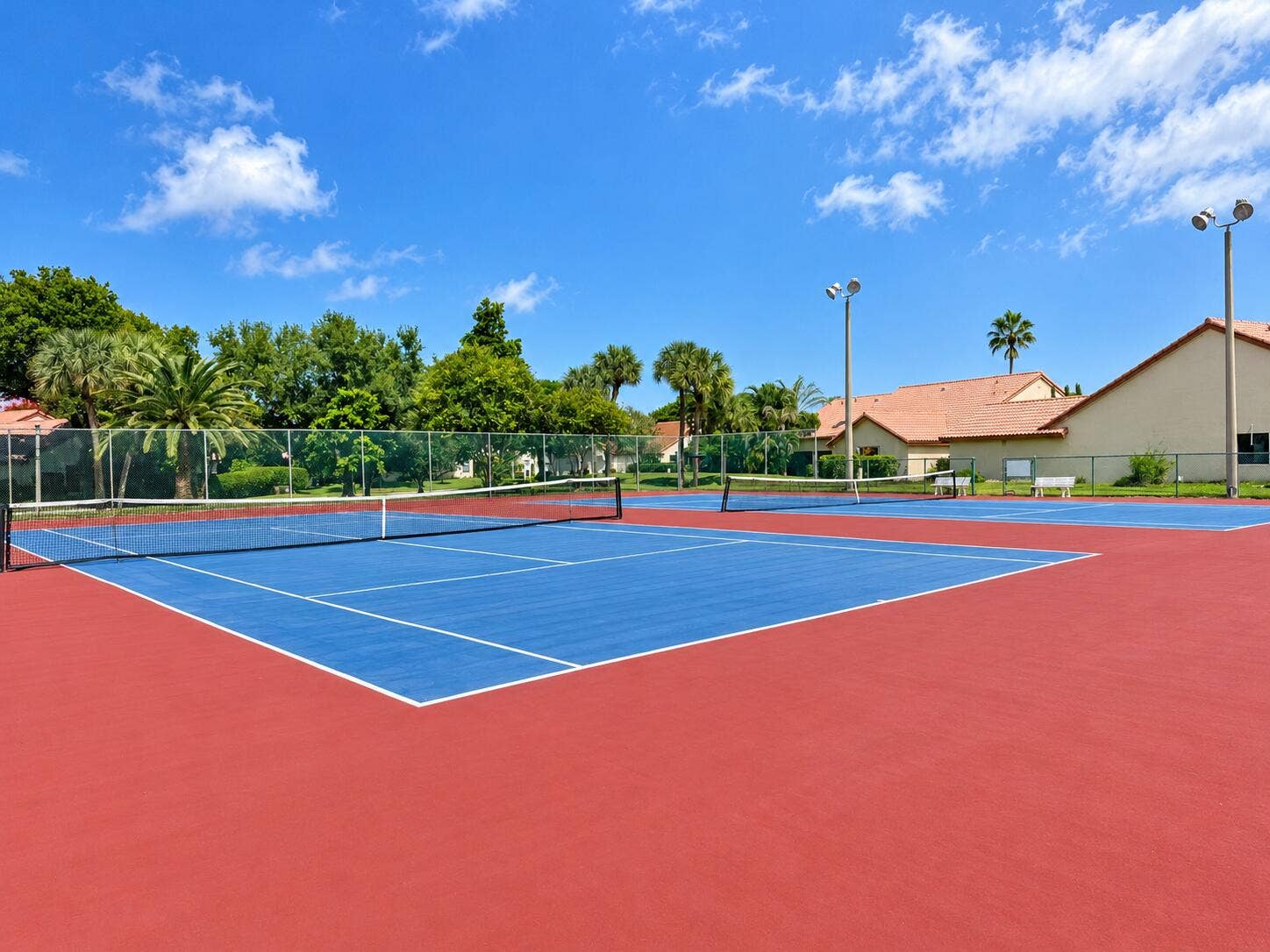 23379 Water Circle, Boca Raton, FL 33486 Sunny Tennis Courts Beneath Blue S