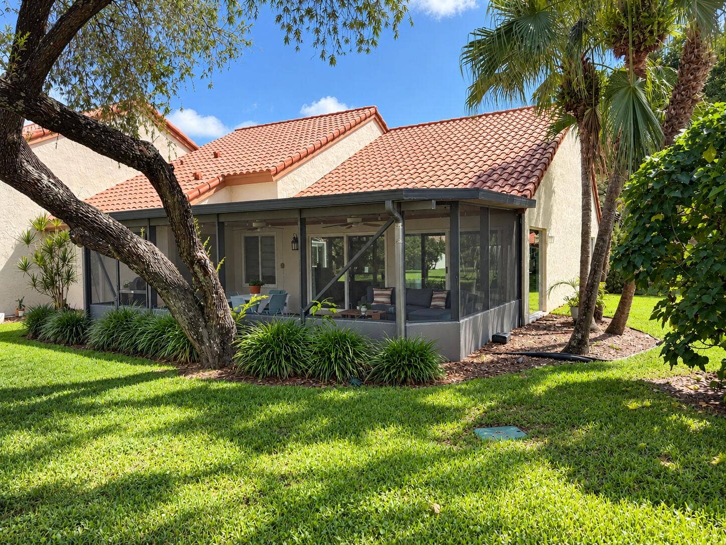 23379 Water Circle, Boca Raton, FL 33486 Sunny Tropical Screened Patio Retreat