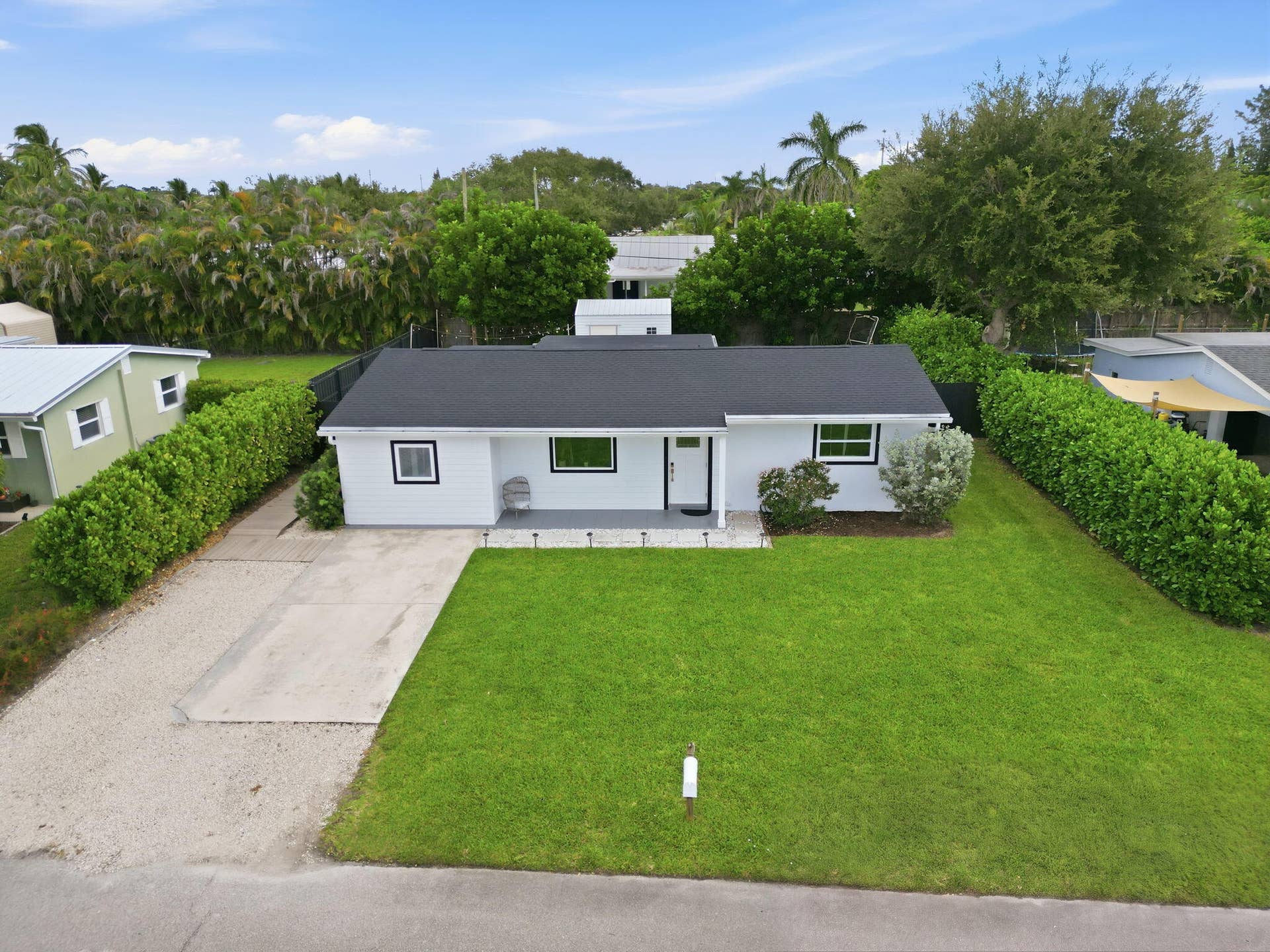 19145 SE Mayo Drive, Jupiter, FL 33469 Aerial Front yard