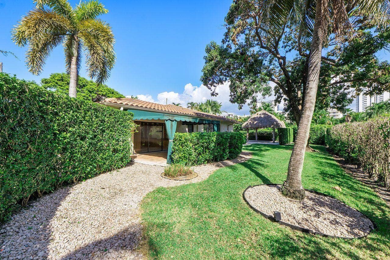 1350 W TERRA MAR Drive, Pompano Beach, FL 33062 South side yard with view of family room