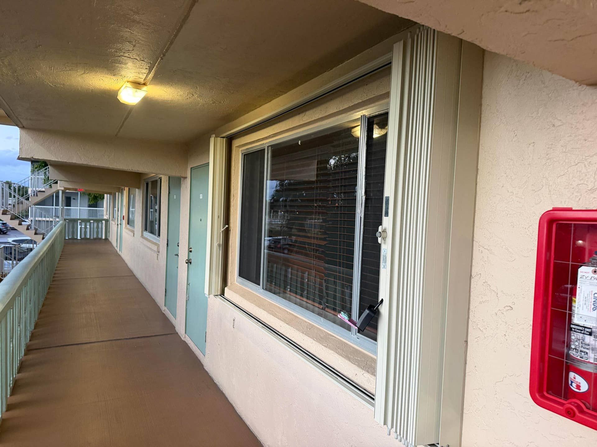 400 VILLAGE GREEN Circle W, #205, Palm Springs, FL 33461 Cat walk-Unit has accordion shutters at picture window