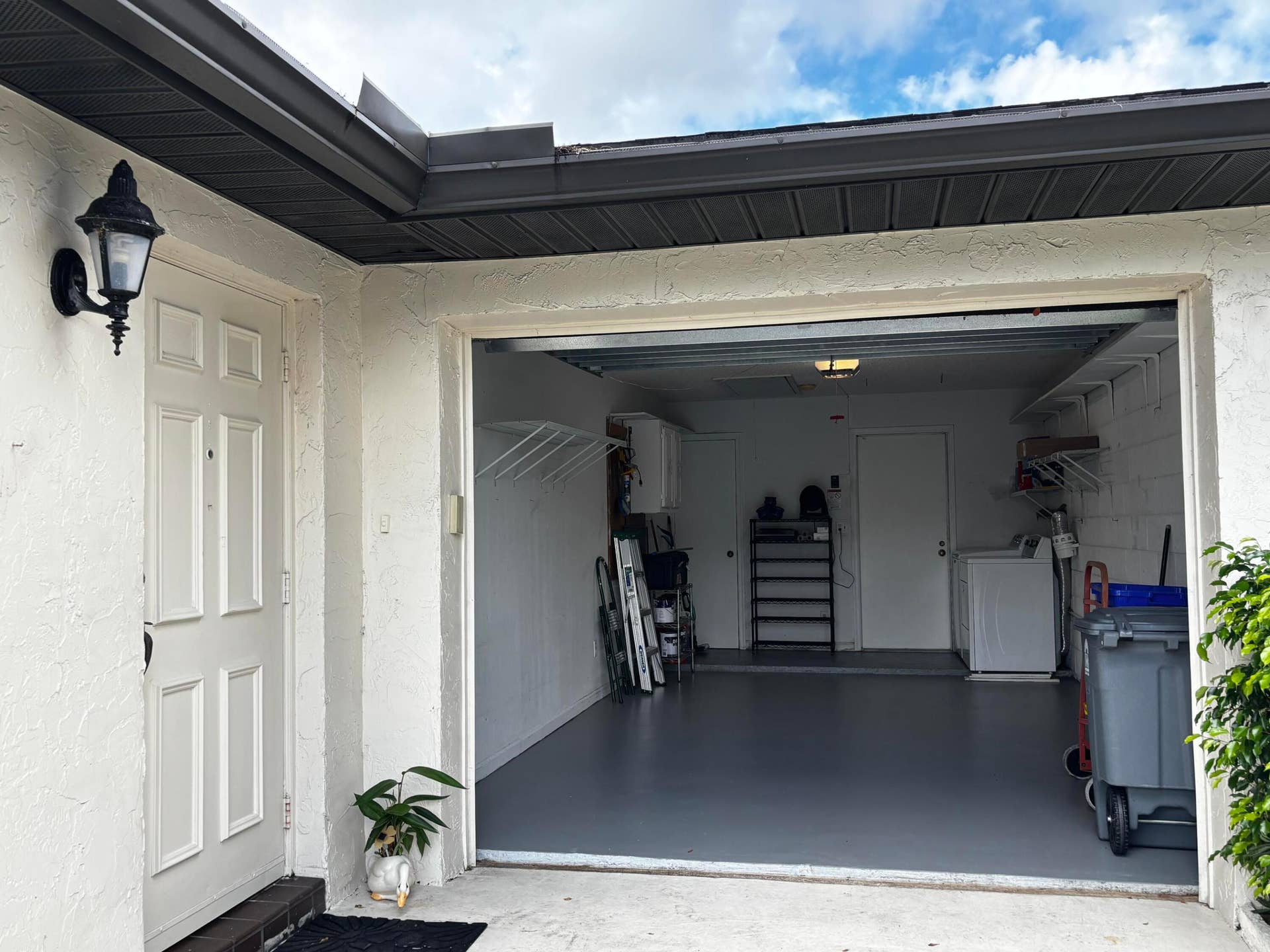 One car garage with washer and dryer
