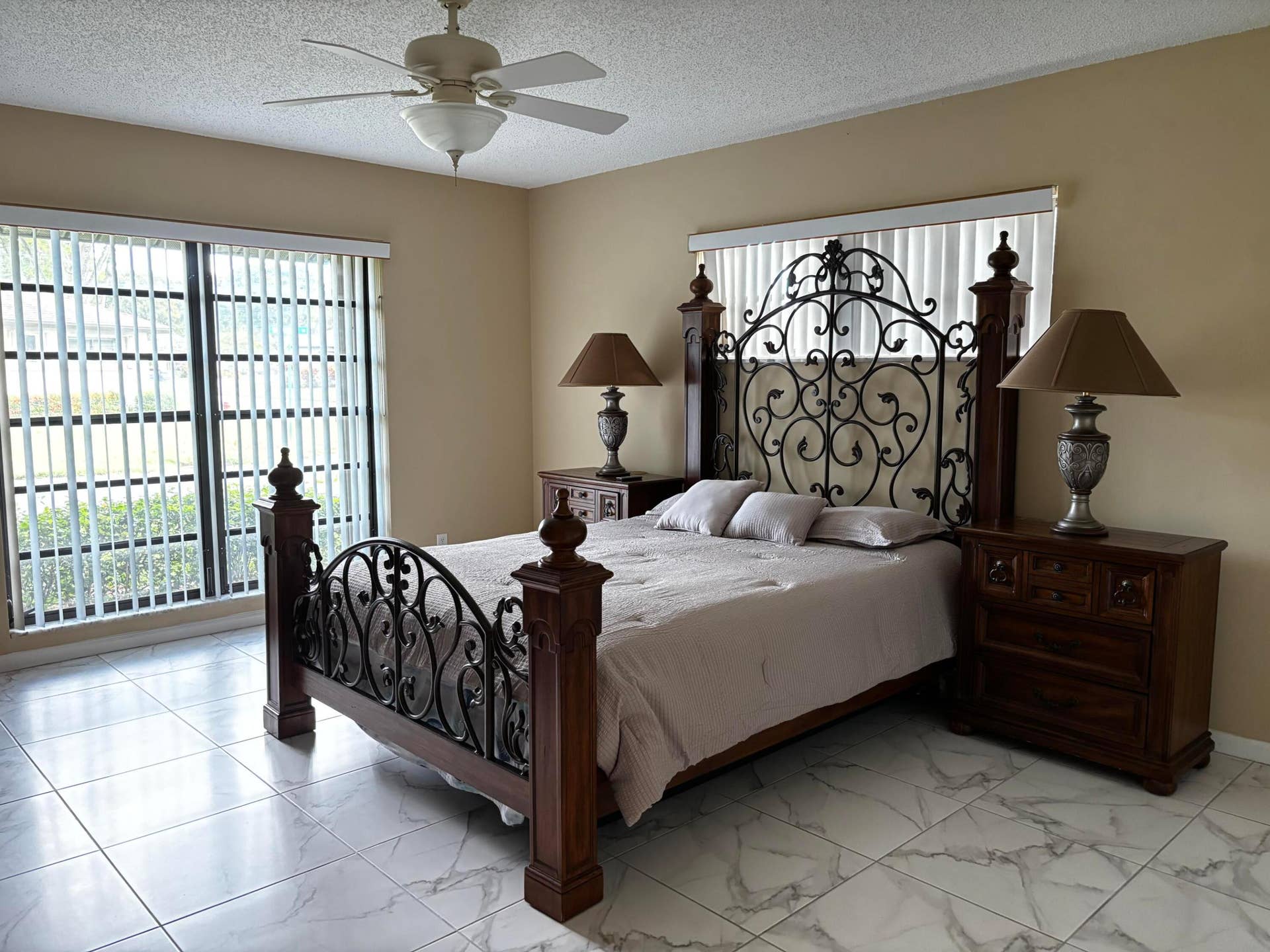 Primary Bedroom, with large windows an abundant natural light