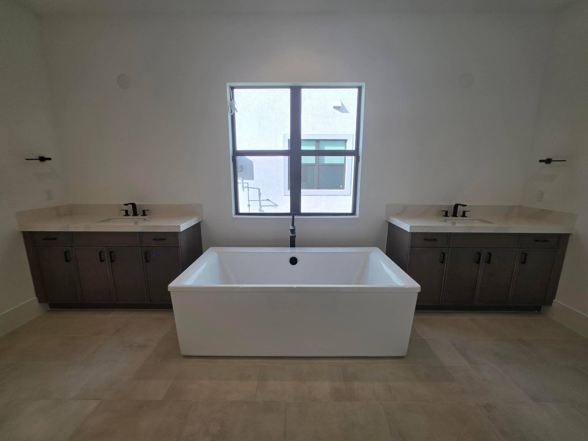 Primary Bathroom Vanities w/ 6' Freestanding Soaking Tub