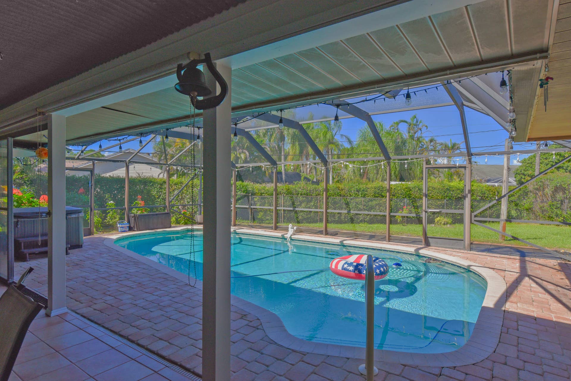 3098 SE BUR Street, Port St Lucie, FL 34952 Enjoy your saltwater pool and spa, surrounded by beautiful paver decking and a screened enclosure. Perfect for outdoor entertaining and relaxation!