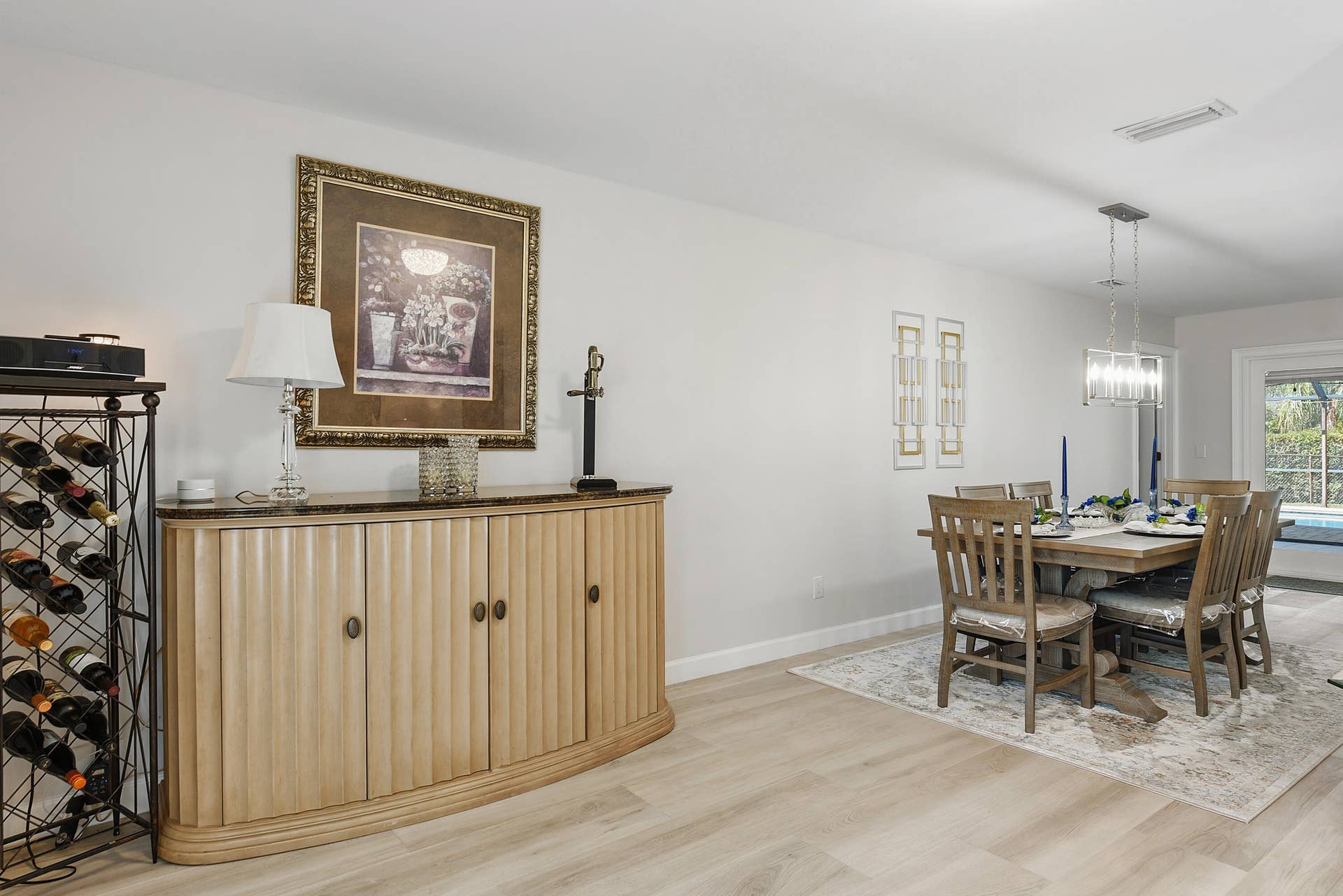 3098 SE BUR Street, Port St Lucie, FL 34952 Open layout with easy access to the pool and outdoor living area.