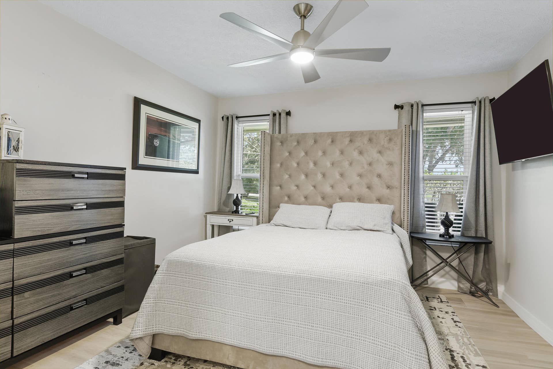 3098 SE BUR Street, Port St Lucie, FL 34952 The desirable triple-split floor plan offers exceptional privacy! Bedroom 2 features its own ensuite bath, making it ideal for guests, extended family, or a mother-in-law arrangement. Beautiful flooring and a new ceiling fan complete the space.