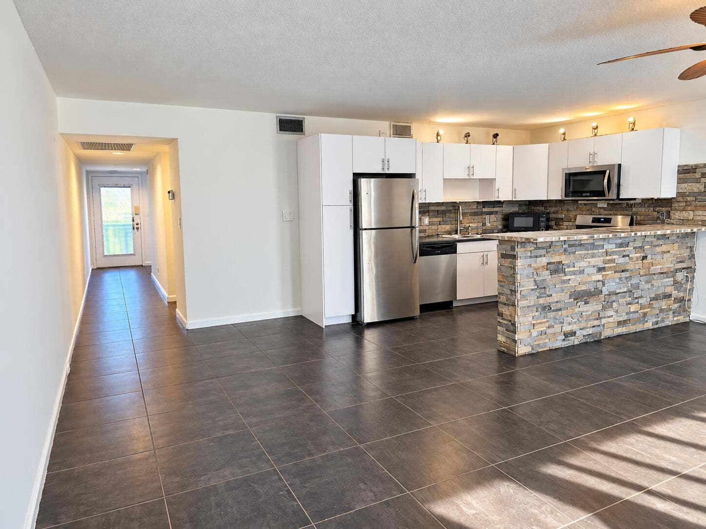 Modern Stone-Accent Kitchen and Hallway